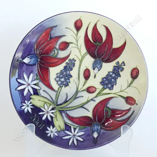 A Moorcroft 2001 Year plate, designed by Nicola Slaney,